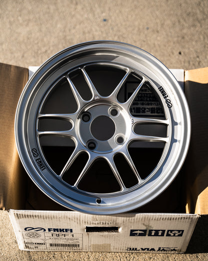 Enkei RPF1 / 15x7 +41 / 4x100 / F1 Plata 